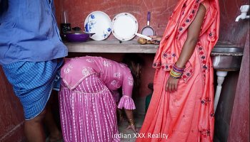 Indian step family in kitchen